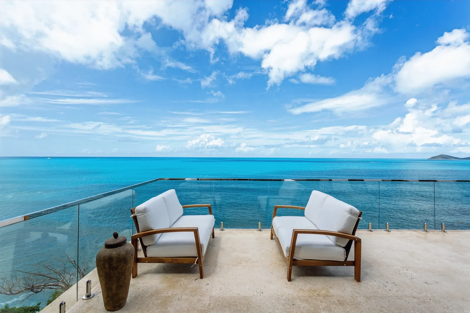 Ocean-view terrace lounge at Villa Maxi Cooper