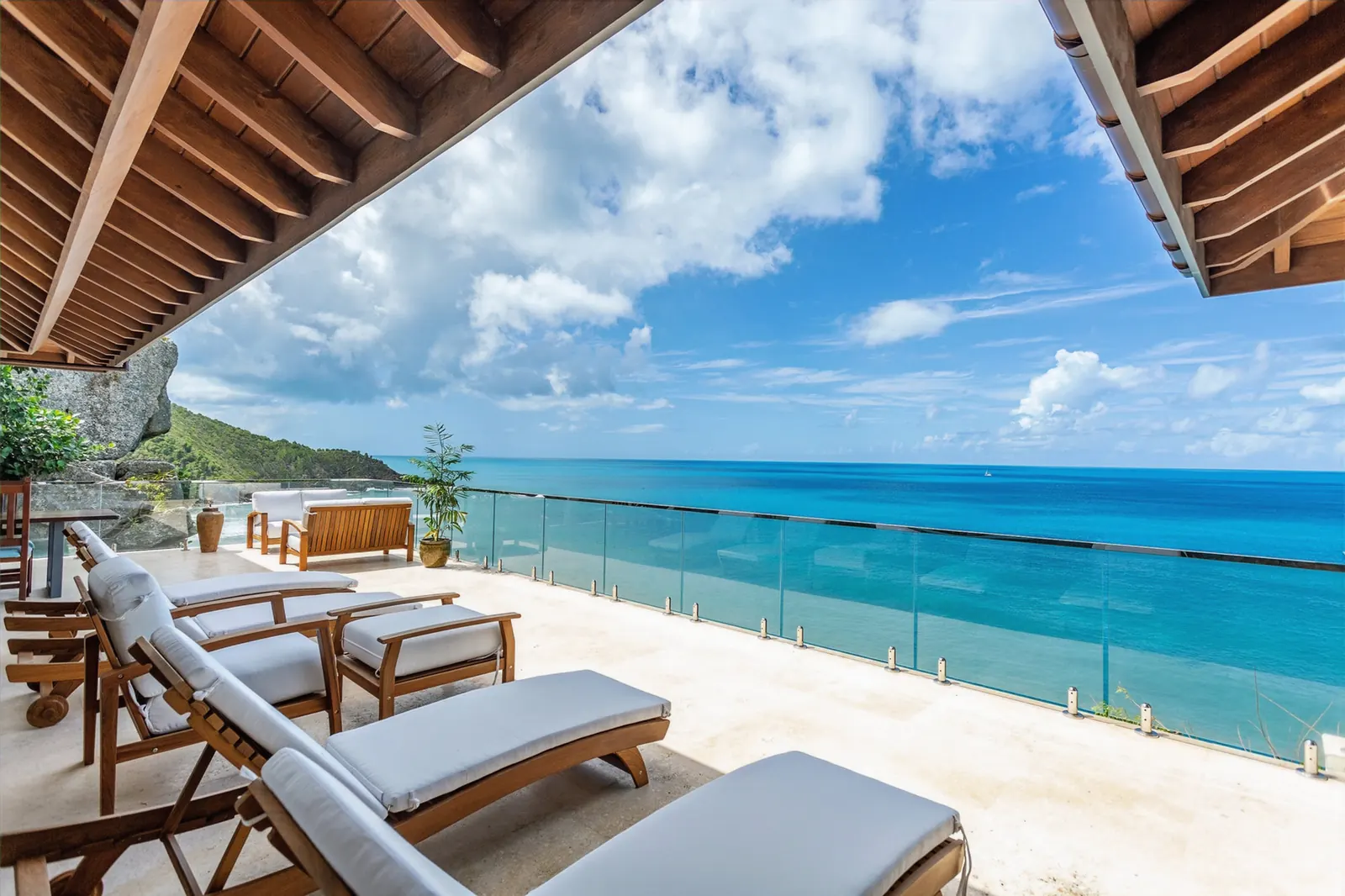 Sun loungers at the M@M Cooper Bay Villas