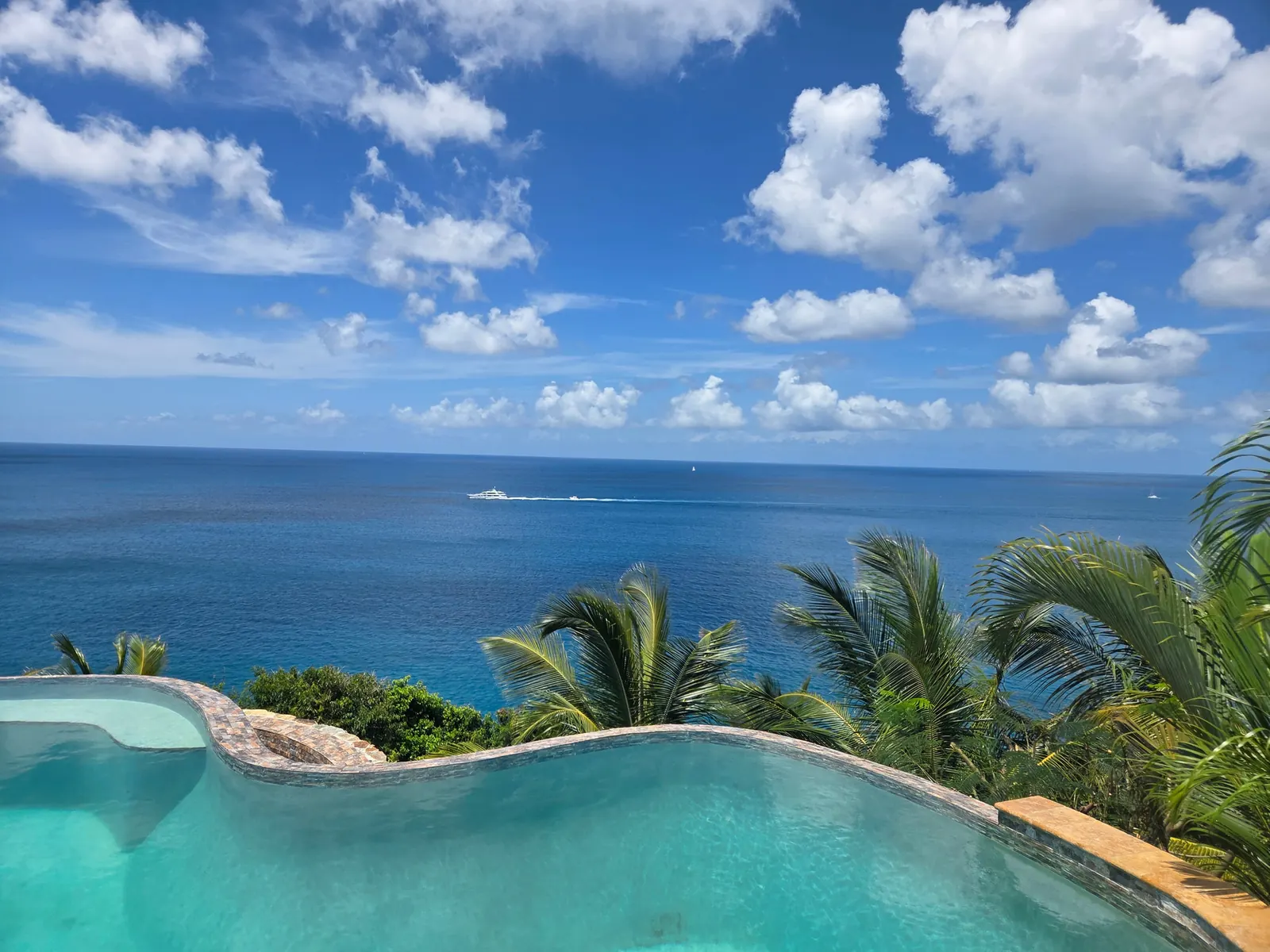 Pool among the palms above the sea, Villa MyALL Tortola
